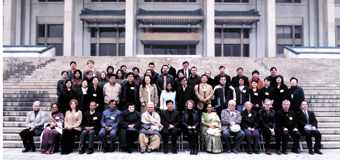 Group photograph of symposium attendees on the steps outside the National Library of China.