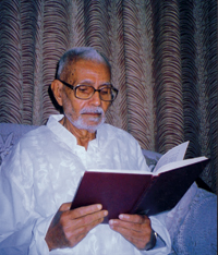 Headshot of Priyatosh Bannerjee, reading.