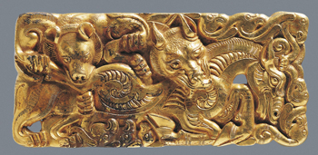 Highly detailed sculptural plaque with entwined animal detail, made of gold.