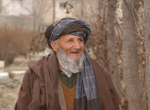 Rahimullah, photographed in the graveyard that he takes care of.
