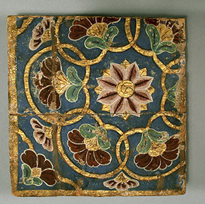 Painted wooden panel with flower motif. 
