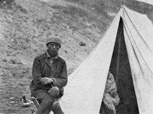 Photograph of Arthur Bollerup Sørensen outside a tent.