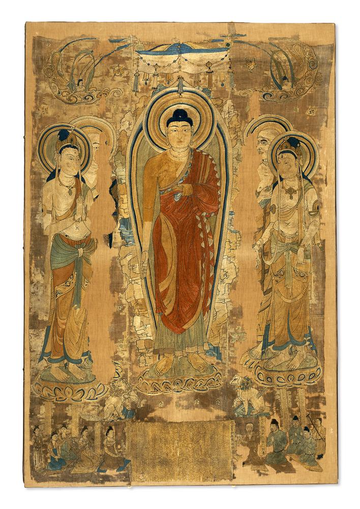 Embroidered image of a large standing Buddha with bodhisattvas on each side, with small human figures below.