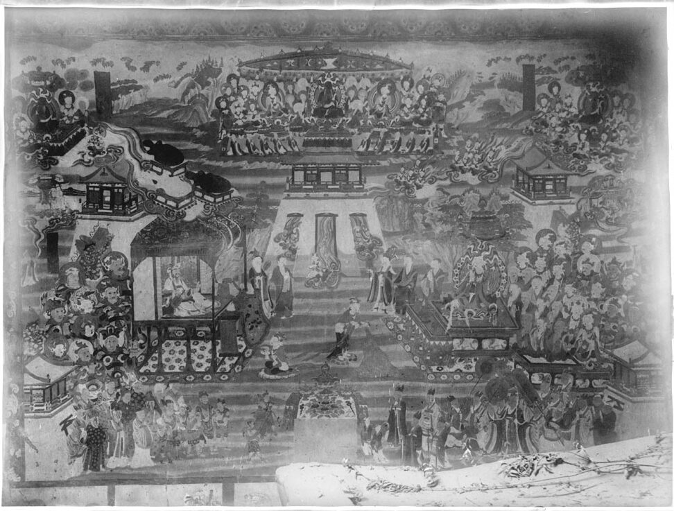 Detailed narrative wall painting in one of the Mogao caves at Dunhuang.