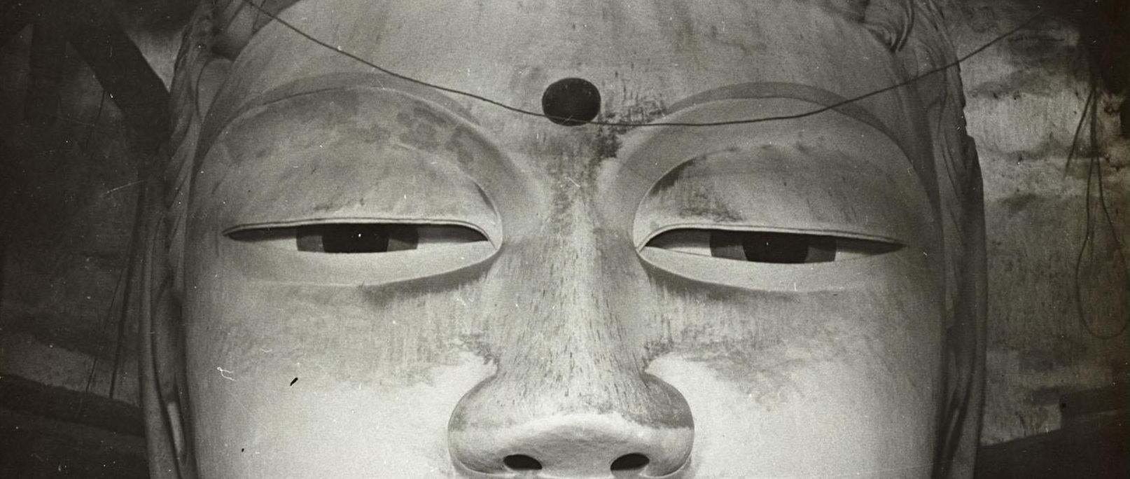 Photograph of the head of a Buddha statue from Dunhuang Mogao cave 96.